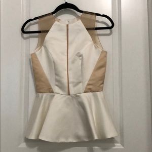 White Peplum Top with mesh.